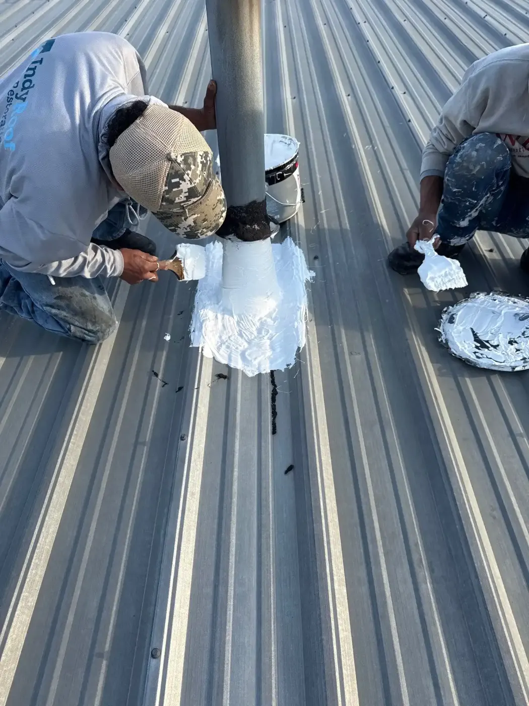 Tarping and dry-in on a Utica commercial roof